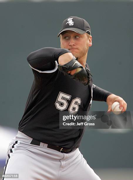 Mark Buehrle of the Chicago White Sox delivers the pitch during a spring training game against the Colorado Rockies at Hi Corbett Field on March 5,...