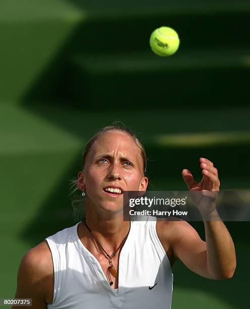 Julia Schruff of Germany catches a ball in her match against Tatiana Poutchek of Belarus during qualifications for the Pacific Life Open at the...