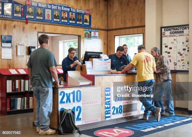 Workers assist customers at the 84 Lumber Co. Retail store in Bridgeville, Pennsylvania, U.S., on Thursday, June 8, 2017. One of the nation's largest...