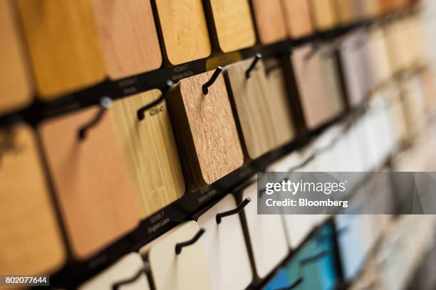 Surface swatches hang on display at the 84 Lumber Co. Retail store in Bridgeville, Pennsylvania, U.S., on Thursday, June 8, 2017. One of the nation's...