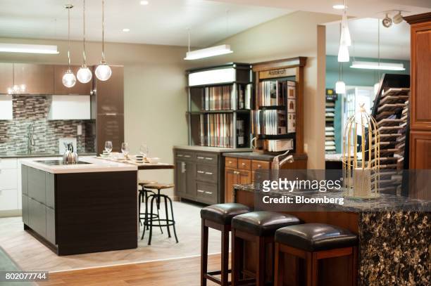 Model kitchens stand on display in the design studio at the 84 Lumber Co. Retail store in Bridgeville, Pennsylvania, U.S., on Thursday, June 8, 2017....