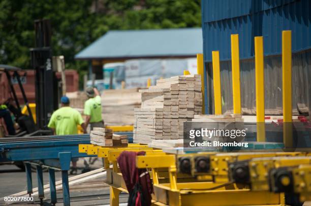 Wood sits stacked near the saw shed at the 84 Lumber Co. California Truss Plant in Coal Center, Pennsylvania, U.S., on Friday, June 9, 2017. One of...