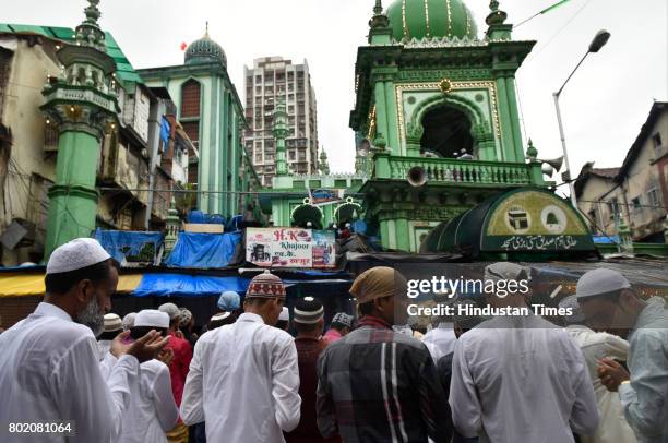 Muslims offer their prayer on Eid-Al-Fitr at Madanpura SUnni Badi Masjid on June 26, 2017 in Mumbai, India.