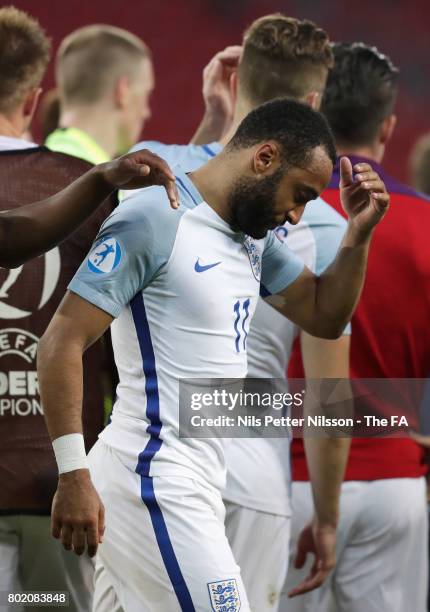Nathaniel Chalobah of England consoles Nathan Redmond of England after he missed England's fifth penatly and sent them out of the tournament during...