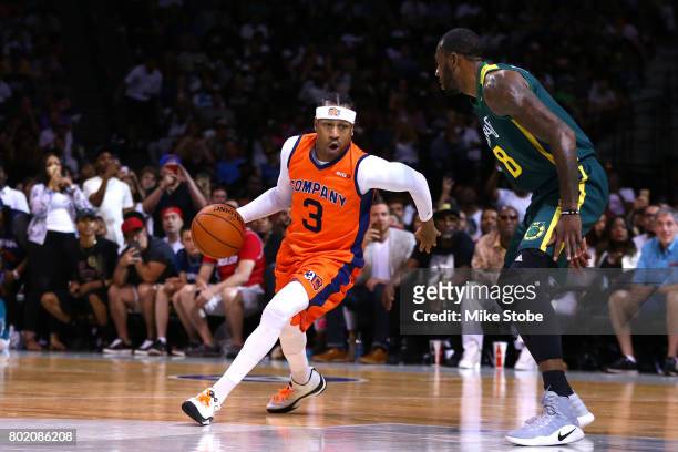 Allen Iverson of 3's Company handles the ball against Dominic McGuire of the Ball Hogs during week one of the BIG3 three on three basketball league...