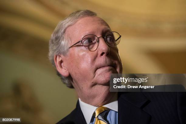 Senate Majority Leader Mitch McConnell listens to a question during a press conference after a closed-door Senate GOP conference meeting on Capitol...