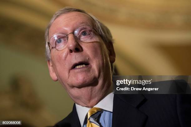 Senate Majority Leader Mitch McConnell speaks during a press conference after a closed-door Senate GOP conference meeting on Capitol Hill, June 27,...