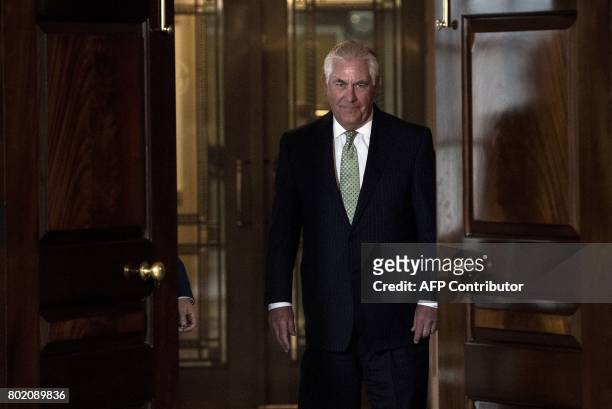 Secretary of State Rex Tillerson arrives before a meeting with Qatar's Foreign Minister Mohammed bin Abdulrahman al-Thani at the US State Department...