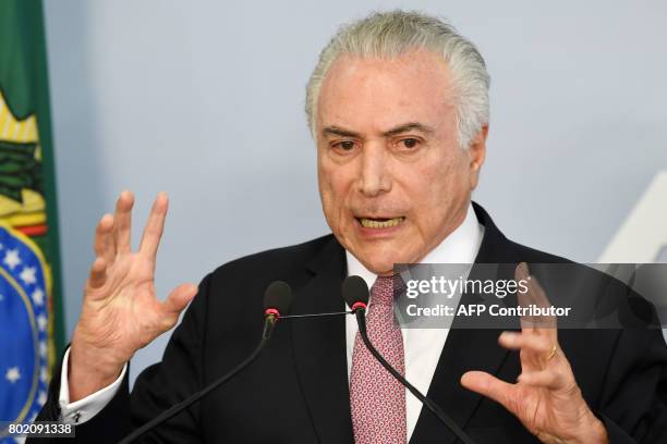 Brazilian President Michel Temer makes a statement rejecting a bribery charge against him, at the Planalto Palace in Brasilia, Brazil, on June 27,...