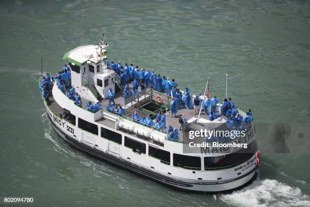 Tourists ride the Maid of the Mist VII boat in Niagara Falls, Ontario, Canada, on Wednesday, June 21, 2017. The 150th anniversary of Canada, promoted...