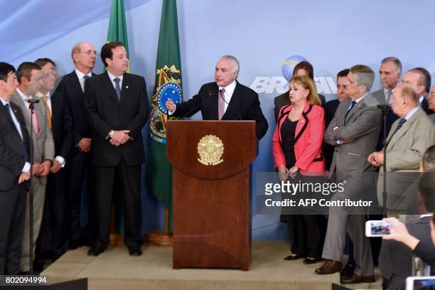 Brazilian President Michel Temer makes a statement rejecting a bribery charge against him, at the Planalto Palace in Brasilia, Brazil, on June 27,...