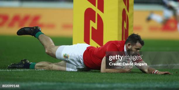 Tommy Seymour of the Lions dives to score his first try during the match between the Hurricanes and the British & Irish Lions at Westpac Stadium on...