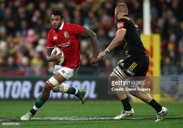 Courtney Lawes of the Lions runs with the ball during the match between the Hurricanes and the British & Irish Lions at Westpac Stadium on June 27,...