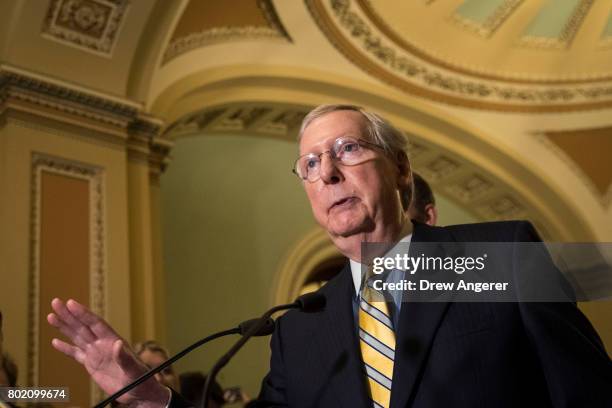 Senate Majority Leader Mitch McConnell speaks during a press conference after a closed-door Senate GOP conference meeting on Capitol Hill, June 27,...