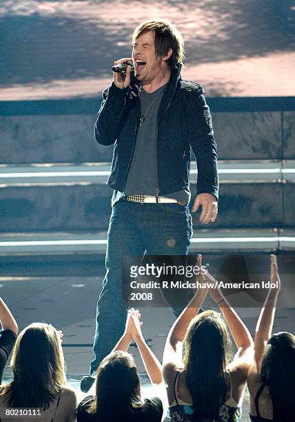 Contestant David Cook performs "Eleanor Rigby" by The Beatles live on American Idol March 11, 2008 in Los Angeles, California. The top 12 contestants...