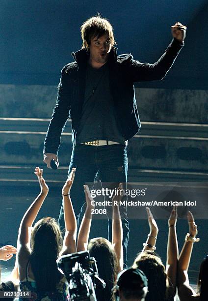 Contestant David Cook performs "Eleanor Rigby" by The Beatles live on American Idol March 11, 2008 in Los Angeles, California. The top 12 contestants...