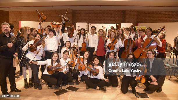 Musician Marilina Bertoldi pose with students during Latin GRAMMY in the School Argentina 2017 at Escuela de Musica Juan Pedro Esnaola on June 27,...