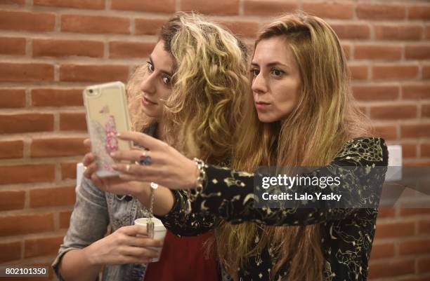 Musician Marilina Bertoldi and moderator Maitena Aboitiz attend Latin Grammy in the School Argentina 2017 at Escuela de Musica Juan Pedro Esnaola on...