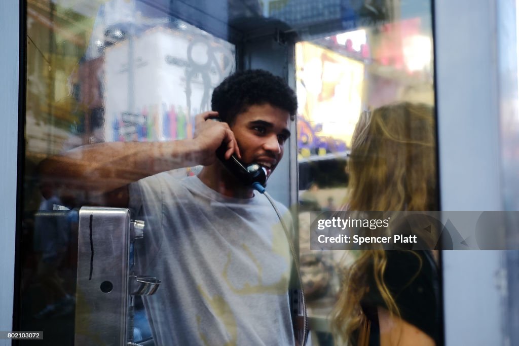 NYC Art Installation Features Phone Booths To Listen To Immigration Stories