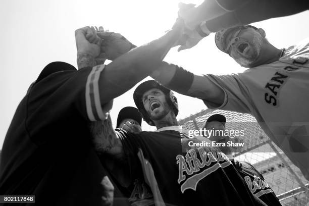 Branden Terrel celebrates with his teammates during their game against the Sonoma Stompers on May 27, 2017 in San Quentin, California. Branden Terrel...