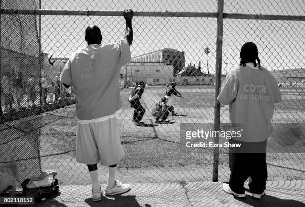 Inmates watch the San Quentin Athletics play against Club Mexico on April 29, 2017 in San Quentin, California. Branden Terrel was sentenced to 11...