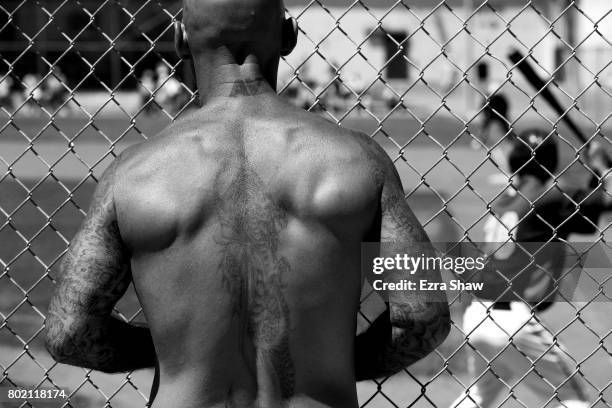 An inmate watches Branden Terrel hit against Club Mexico on April 29, 2017 in San Quentin, California. Branden Terrel was sentenced to 11 years in...