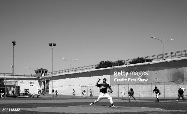 Branden Terrel pitches against Club Mexico on April 29, 2017 in San Quentin, California. Branden Terrel was sentenced to 11 years in state prison for...