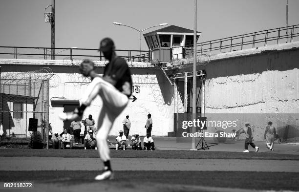 Branden Terrel pitches against Club Mexico on April 29, 2017 in San Quentin, California. Branden Terrel was sentenced to 11 years in state prison for...