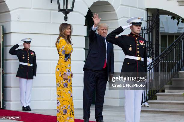 President Donald Trump and First Lady Melania Trump, bid goodbye to Prime Minister Narendra Modi of India, as he left the South Portico of the White...