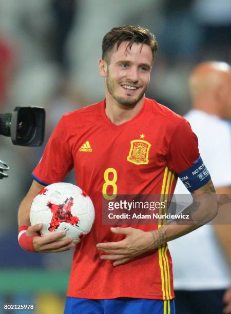 Saul Niguez of Spain collects the match ball for his hatrick during the UEFA European Under-21 Championship Semi Final match between Spain and Italy...