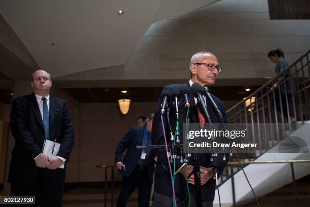 Former Hillary Clinton Campaign Chairman John Podesta speaks to reporters after meeting with the House Intelligence Committee on Capitol Hill, June...