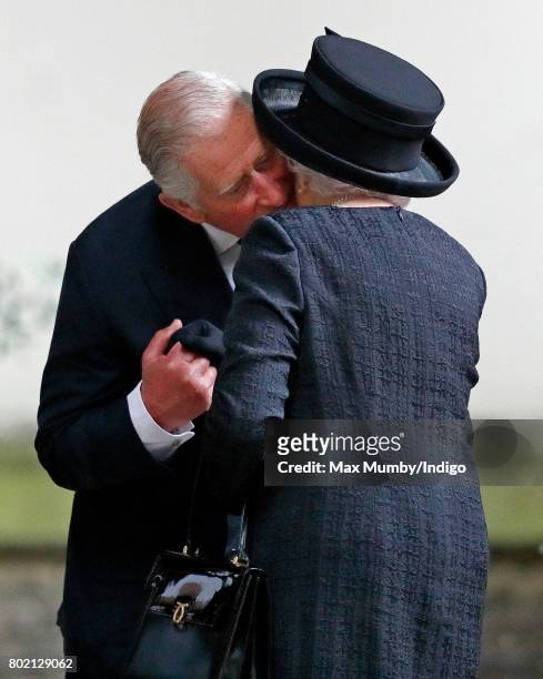 Prince Charles, Prince of Wales kisses his mother Queen Elizabeth II as they attend the funeral of Patricia Knatchbull, Countess Mountbatten of Burma...
