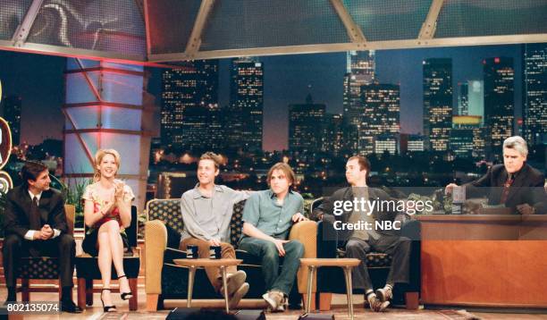 Pictured: Actors Jenna Elfman and Noah Wyle, musical group Ben Folds Five, and host Jay Leno during an interview on February 25, 1998 --