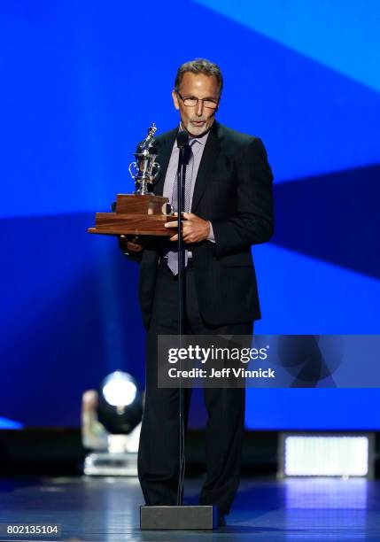 Head coach John Tortorella of the Columbus Blue Jackets speaks onstage after being awarded the Jack Adams Award during the 2017 NHL Awards &...