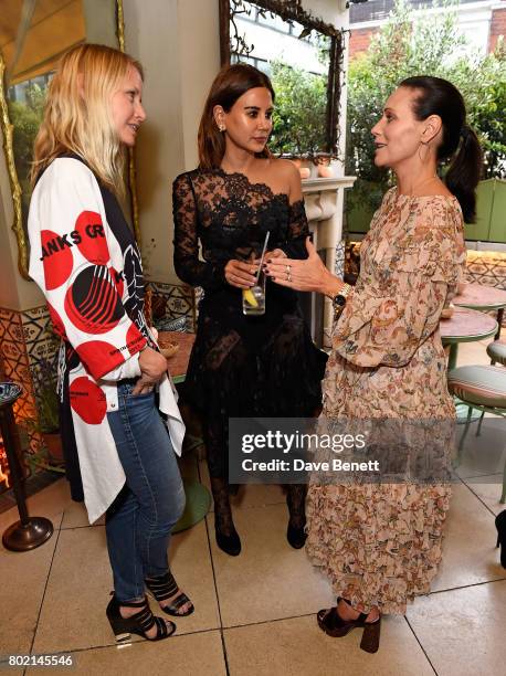 Guest, Christine Centenera and Nicky Zimmermann attend an intimate dinner hosted by Nicky Zimmermann and Margot Robbie to celebrate the opening of...