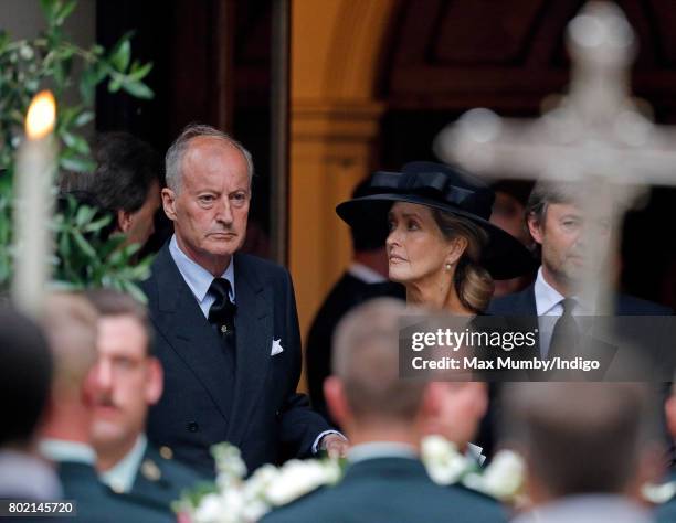 Norton Knatchbull, Earl Mountbatten of Burma accompanied by his wife Penny, Countess Mountbatten of Burma attends the funeral of his mother Patricia...