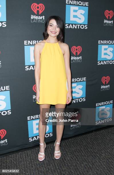 Miranda Cosgrove visits the I Heart Latino show with Enrique Santos to promote her film "Despicable Me 3" on June 27, 2017 in Miami, Florida.