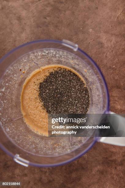 chia seeds in container of blender. - schleimschicht stock-fotos und bilder