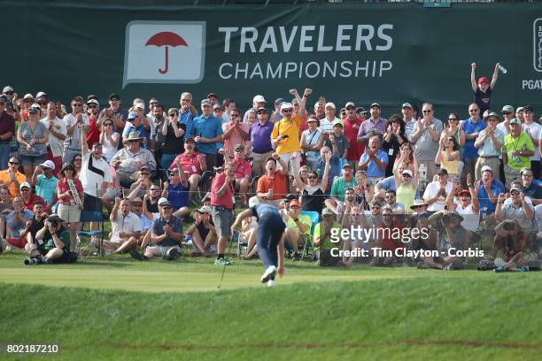 June 25: The crowd cheers as Daniel Berger birdies on the seventeenth during the fourth round of the Travelers Championship Tournament at the TPC...
