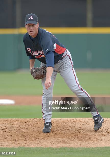 Tom Glavine of the Atlanta Braves pitches during the spring training game against the Detroit Tigers at Joker Marchant Stadium in Lakeland, Florida...