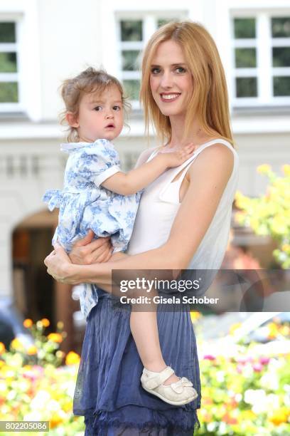 Wilma Elles poses with her daughter Melodi during a photo session on June 27, 2017 in Munich, Germany.
