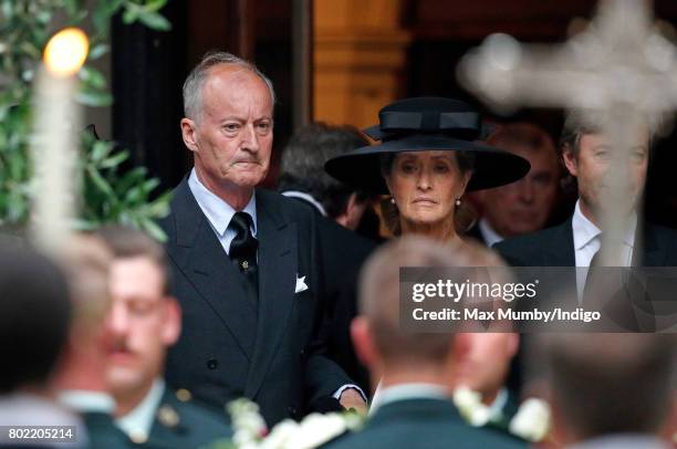 Norton Knatchbull, Earl Mountbatten of Burma accompanied by his wife Penny, Countess Mountbatten of Burma attends the funeral of his mother Patricia...