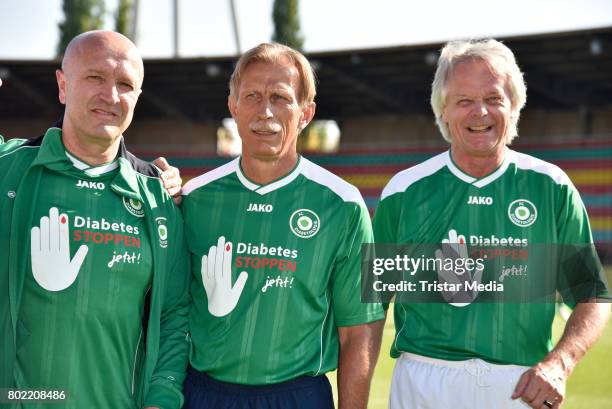 Christoph Daum with two members of the Diabetic Team during the 'FC Bundestag against FC Diabetologie' Charity Event at Friedrich-Ludwig-Jahn...