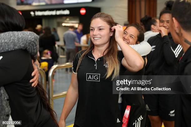 Michaela Blyde with the New Zealand Black Ferns as they arrive at Auckland International Airport, with the World Sevens Series Trophy on June 28,...