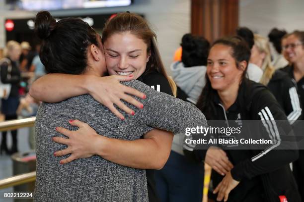 Michaela Blyde with the New Zealand Black Ferns is welcomed as they arrive at Auckland International Airport, with the World Sevens Series Trophy on...