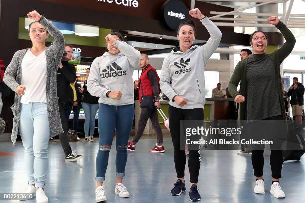 Portia Woodman and Theresa Fitzpatrick are joined by other home based Black Ferns to welcome the New Zealand Black Ferns arrive at Auckland...