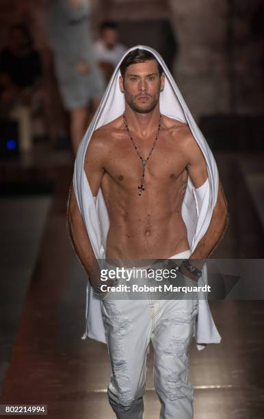 Model walks the runway at the Amoramargo show during the Barcelona 080 Fashion Week on June 27, 2017 in Barcelona, Spain.