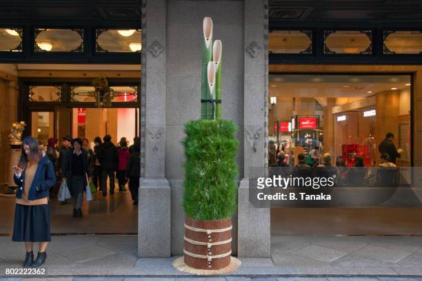 new year's decoration of fresh pine-and-bamboo at takashimaya department store in tokyo, japan - japan men of the year 2016 stock pictures, royalty-free photos & images