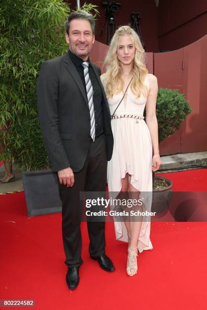 Dieter Bach and Larissa Marolt during the Bavaria Film reception during the Munich Film Festival 2017 at Kuenstlerhaus am Lenbachplatz on June 27,...