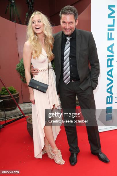 Dieter Bach and Larissa Marolt during the Bavaria Film reception during the Munich Film Festival 2017 at Kuenstlerhaus am Lenbachplatz on June 27,...